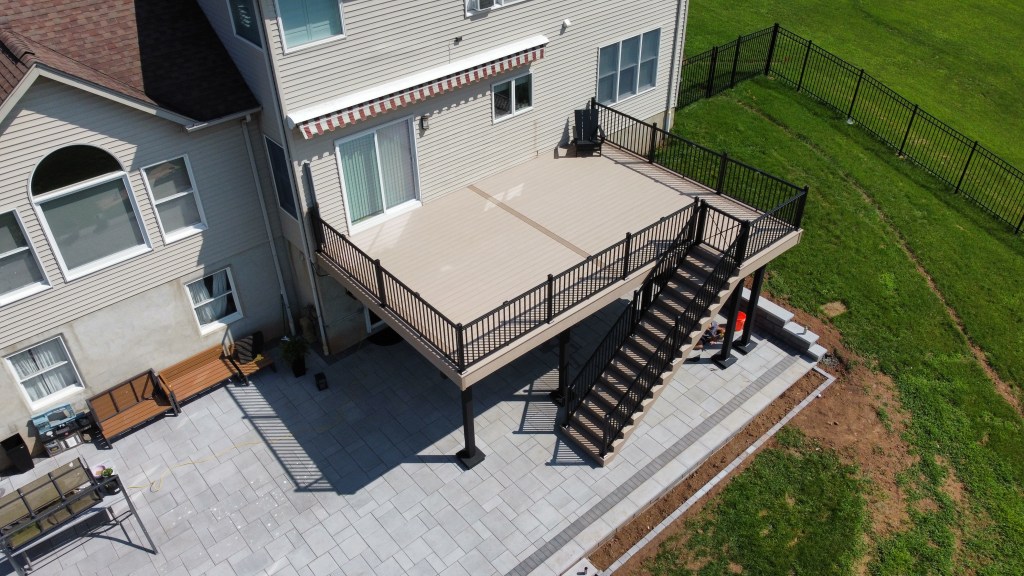Aerial view of a WOLF PVC Sand Castle deck with black RDI aluminum railings in Bridgewater New Jersey