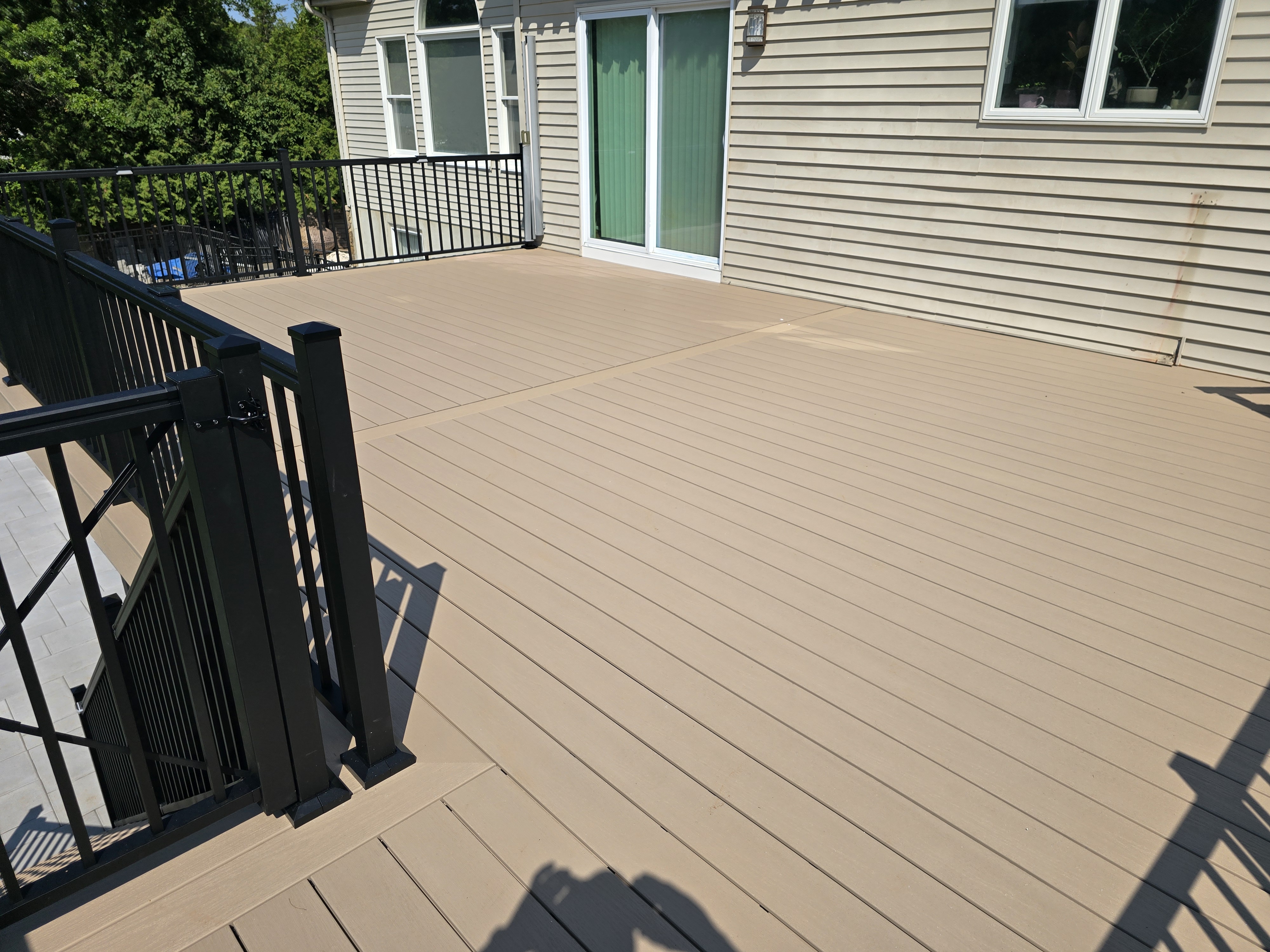 Close view of WOLF Sand Castle PVC decking installed by Prime Decks